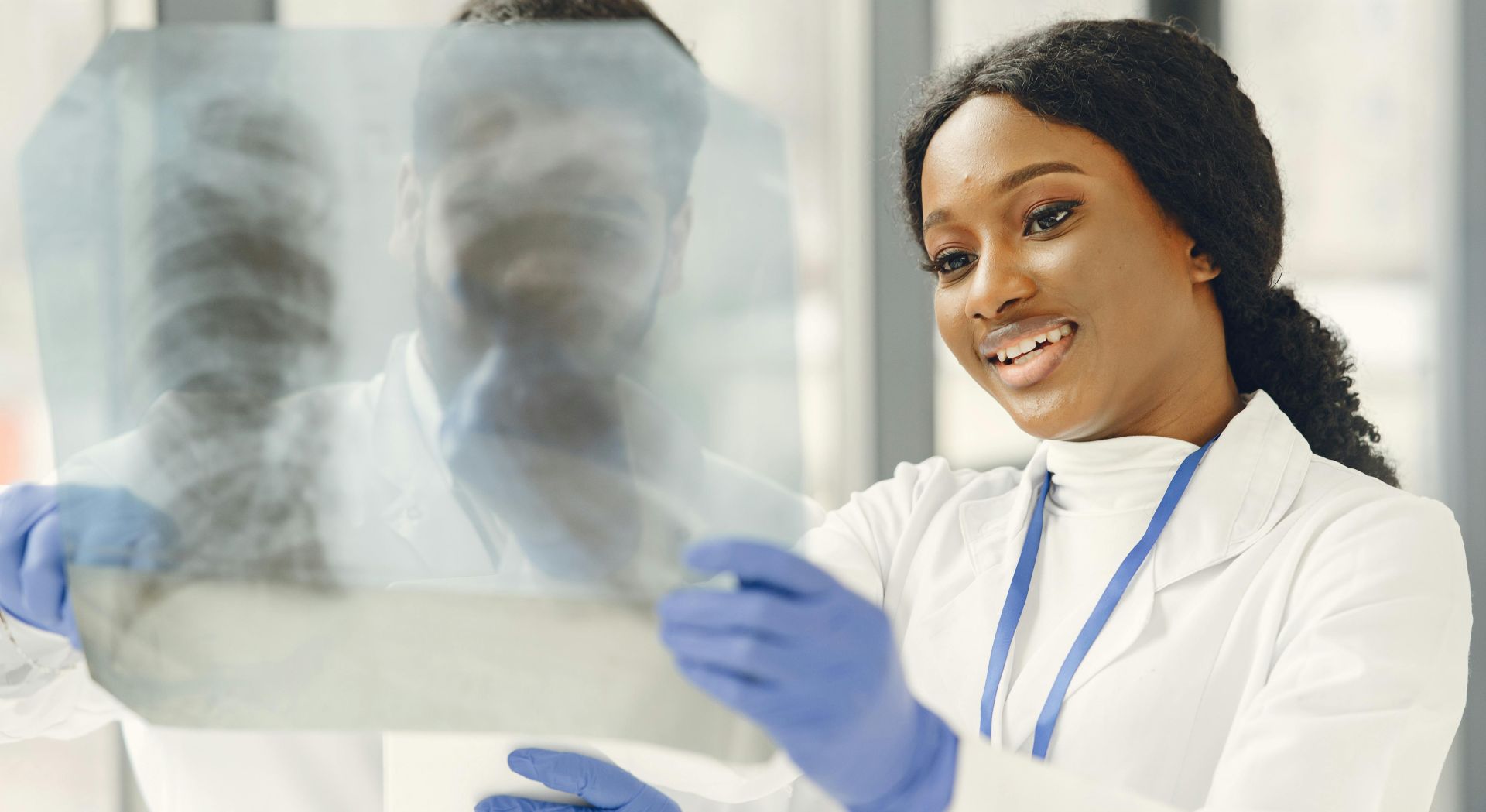 Woman Looking at a X-ray Film