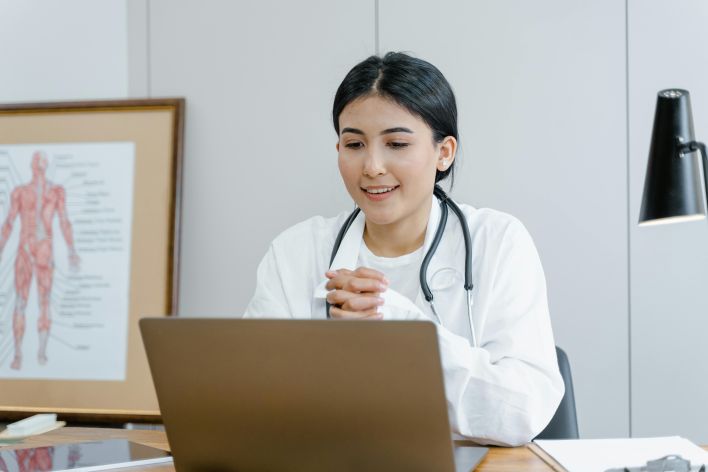 A Woman Using a Laptop